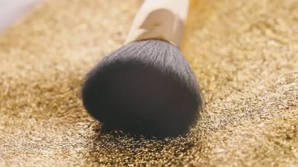 Makeup Brush Shot Close Golden Surface — Vídeo de Stock