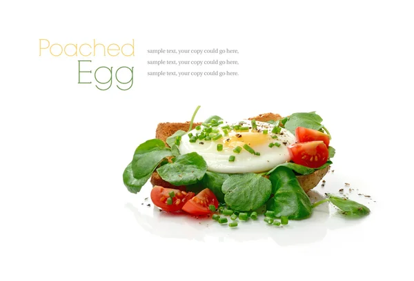 Poached egg with watercress on toast — Stock Photo, Image