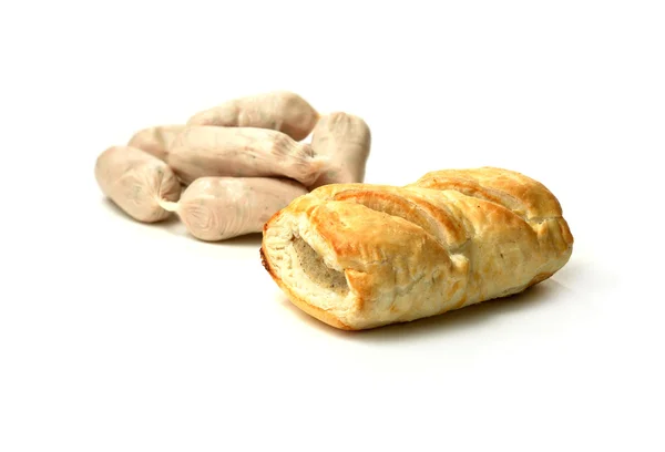 Raw Sausages and Sausage Roll — Stock Photo, Image