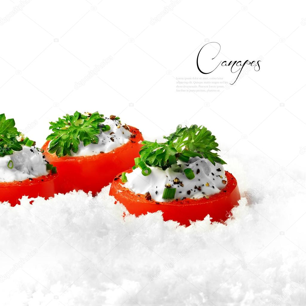 Stuffed tomatoes with soft cheese