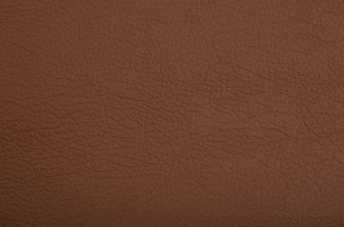 Deri malzemesi sahte deri keten yakın plan makro arkaplan resmi boş katı yapay yapısal dolgu duvar kağıdı yazılmamış deri kumaş kumaş kabarık yüzey dokusu kahverengi