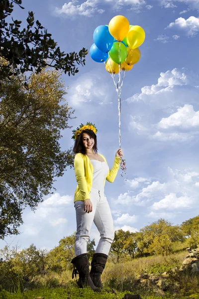 Girl with balloons — Stock Photo, Image