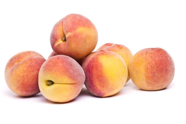 Tasty peaches on white — Stock Photo, Image