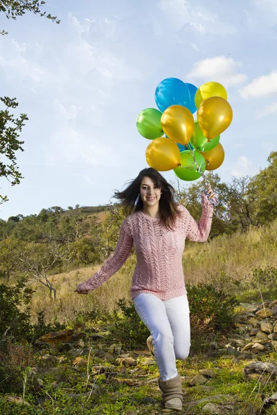 Girl with balloons — Stock Photo, Image