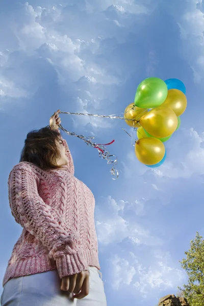 Girl with balloons — Stock Photo, Image