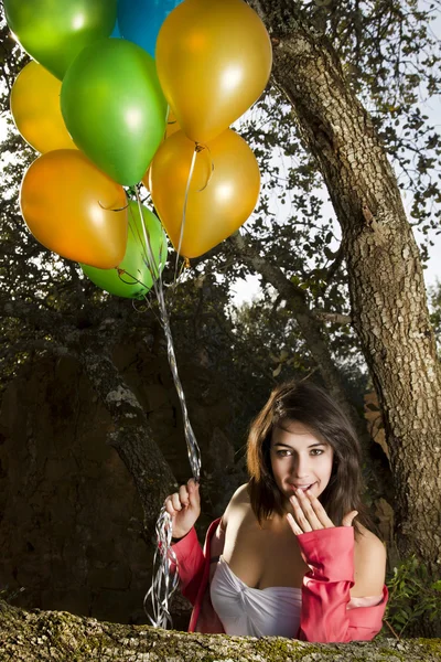 Girl with balloons — Stock Photo, Image