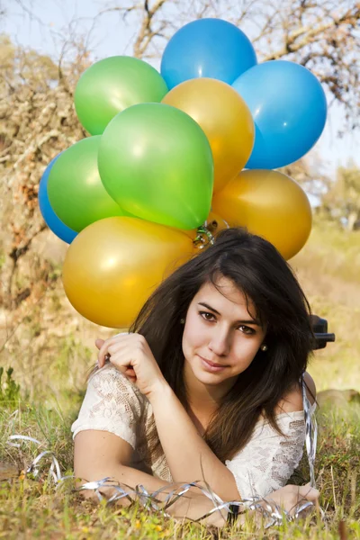 Girl with balloons — Stock Photo, Image