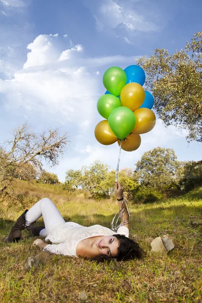 Girl with balloons — Stock Photo, Image