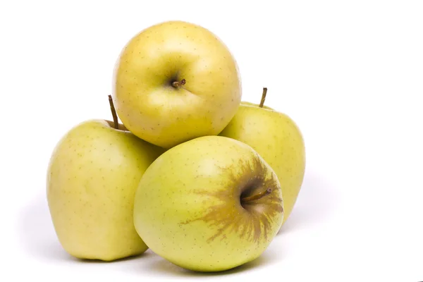 Gula äpplen på vit — Stockfoto