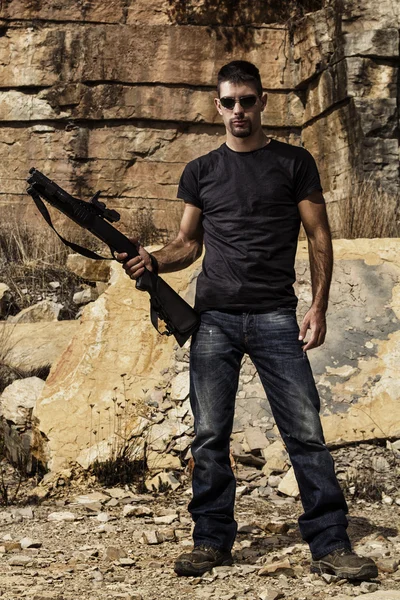 Man with a shotgun — Stock Photo, Image