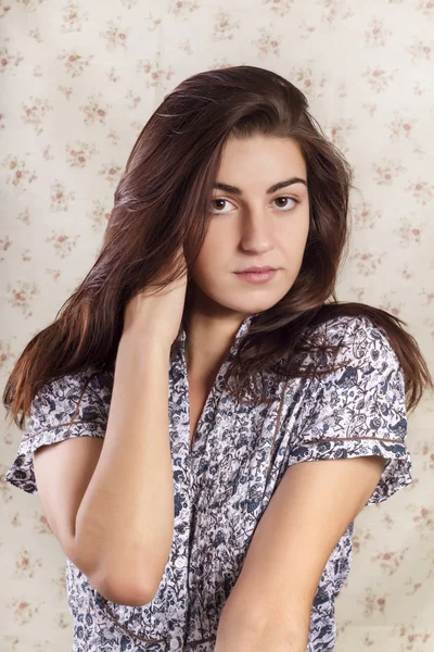 Beautiful girl with flower background — Stock Photo, Image