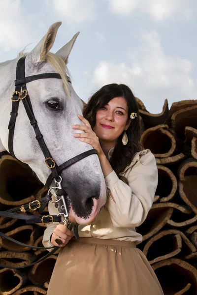 Classical girl with a white horse — Stock Photo, Image