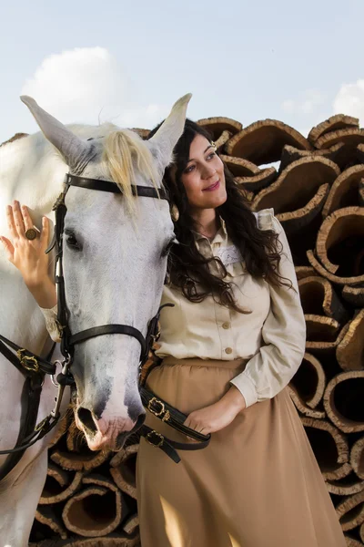 Classical girl with a white horse — Stock Photo, Image