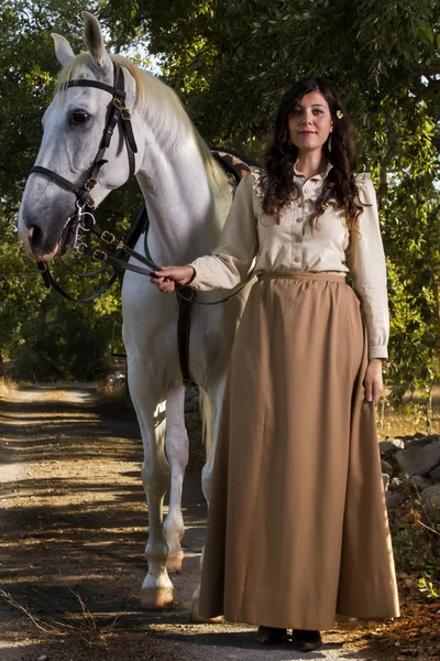 Classical girl with a white horse — Stock Photo, Image