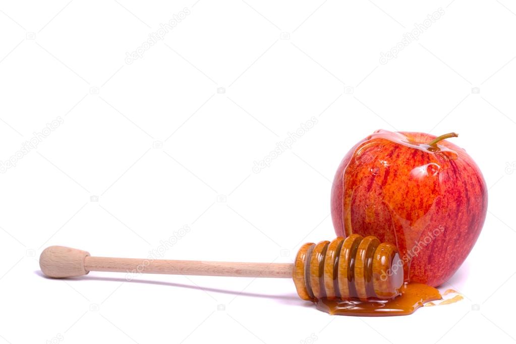 apple with honey dipper