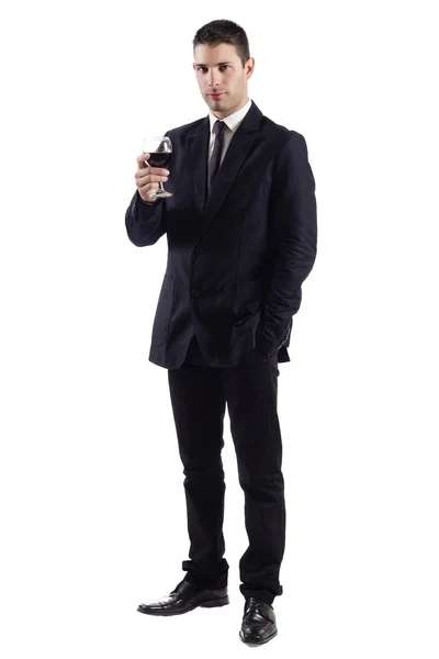 Homem segurando um copo vermelho de vinho fino — Fotografia de Stock