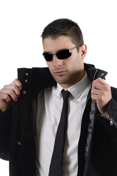 Hombre en un traje con chaqueta con gafas oscuras — Foto de Stock