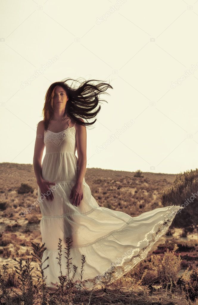 Girl with white dress in the forest