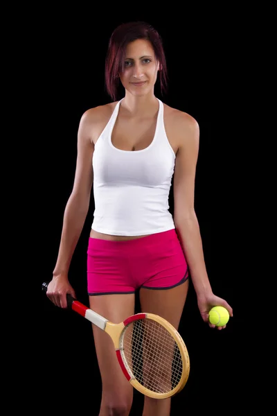 Schönes junges Mädchen spielt Tennis — Stockfoto