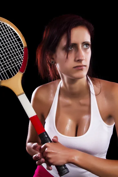 Vacker ung flicka spela tennis — Stockfoto