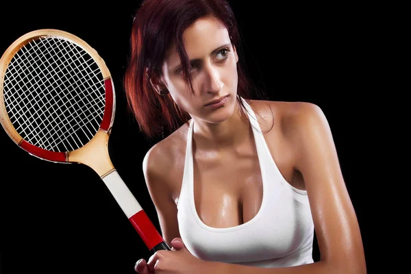 Belle jeune fille jouant au tennis — Photo