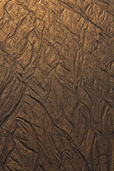 Текстурированные линии фона на песке — стоковое фото