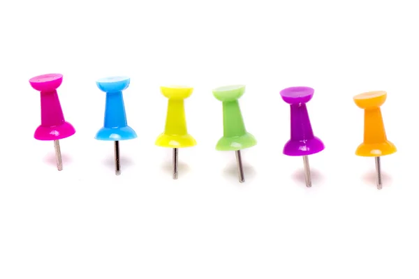 Pinned colorful push pins — Stock Photo, Image