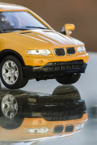 Yellow miniature toy car — Stock Photo, Image