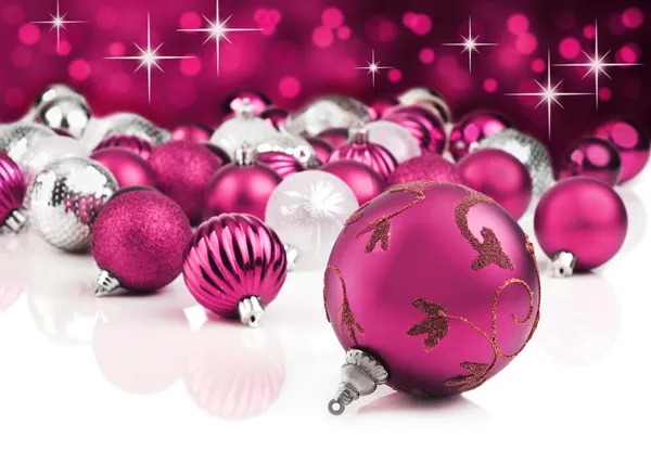Pink decorative christmas ornaments with star background Stock Picture