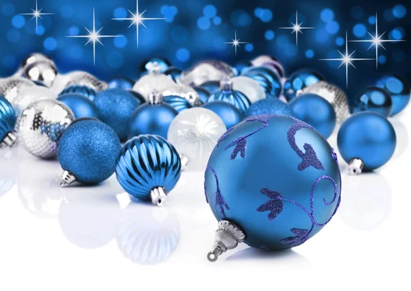 Blue decorative christmas ornaments with star background Royalty Free Stock Images