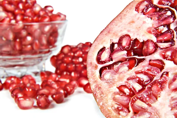 Pomegranate fruit and pipps — Stock Photo, Image