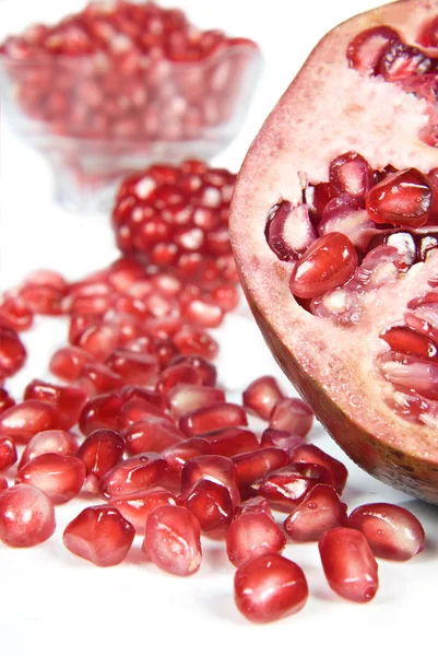 Pomegranate fruit and pipps — Stock Photo, Image