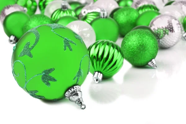 Green christmas ornament baubles on white — Stock Photo, Image
