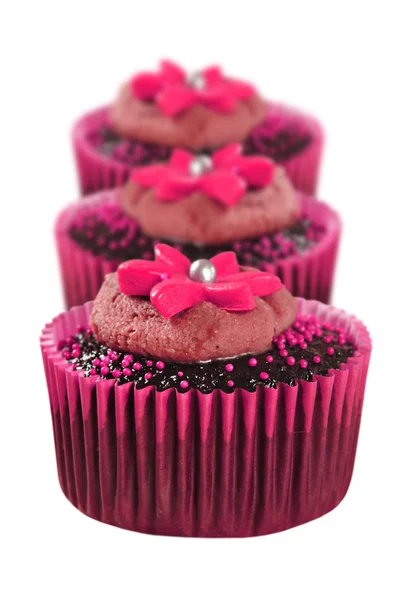 Lovely chocolate cupcakes decorated in pink — Stock Photo, Image