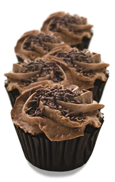 Deliziosi cupcake al cioccolato fresco - profondità di campo molto bassa Foto Stock