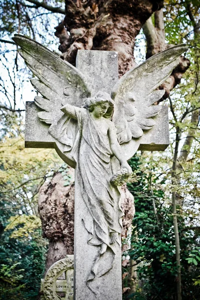 Angel on cross statue — Stock Photo, Image