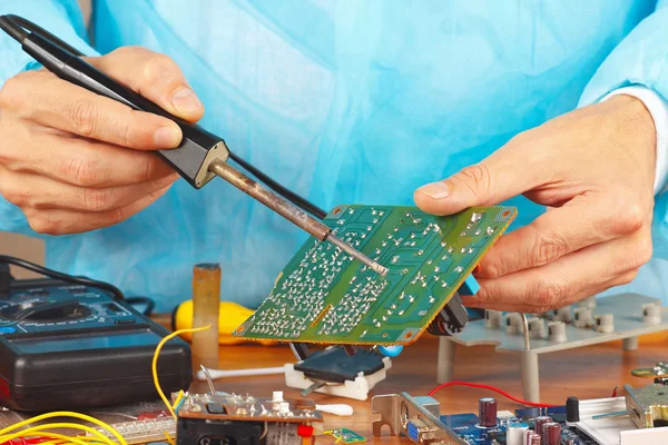 Soldering electronic board of device in service workshop