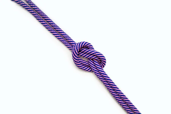 Multi Colored Blue Pink Rope Knot White Background Placed Diagonally — Stock Photo, Image