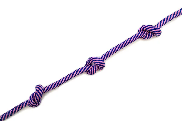 Sokszínű Kötél Három Csomóval Fehér Háttéren Egy Erős Kék Rózsaszín — Stock Fotó