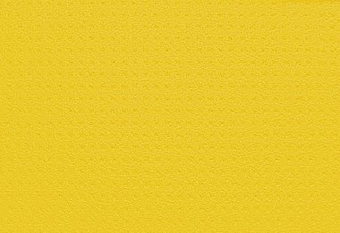 Mutfak süngerinden gözenekli sarı arka plan. Yumuşak sentetik maddeden yapılmış sarı arkaplan ve kaotik gözenekler. Reklamlar ve metin için boş alan