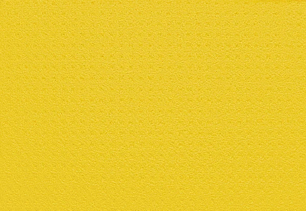 Fundo Amarelo Poroso Uma Esponja Cozinha Fundo Amarelo Feito Material — Fotografia de Stock