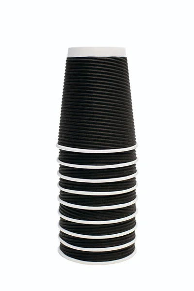 Black Disposable Cardboard Cups Stacked Pile White Vertical Background Lots — Φωτογραφία Αρχείου