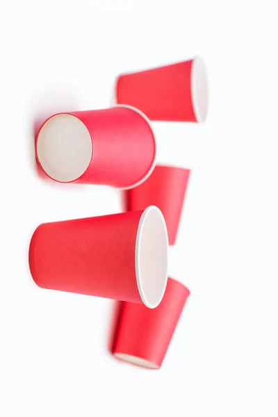 Disposable Red Paper Cups Coffee Drinks White Background Unrealistic Gravity —  Fotos de Stock