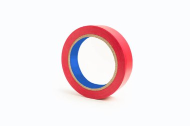Skein of red electrical tape on a white background in the center of the image. Tool for insulating wiring in electrical systems. Reel of electrical tape for electrical work during construction