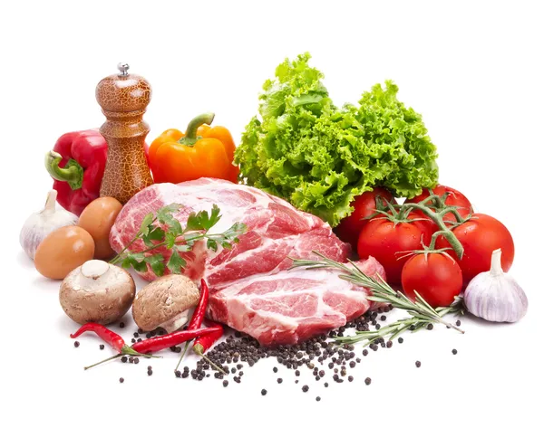 Still life with raw pork meat and fresh vegetables — Stock Photo, Image