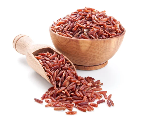 Red rice in a wooden bowl isolated on white — Stock Photo, Image