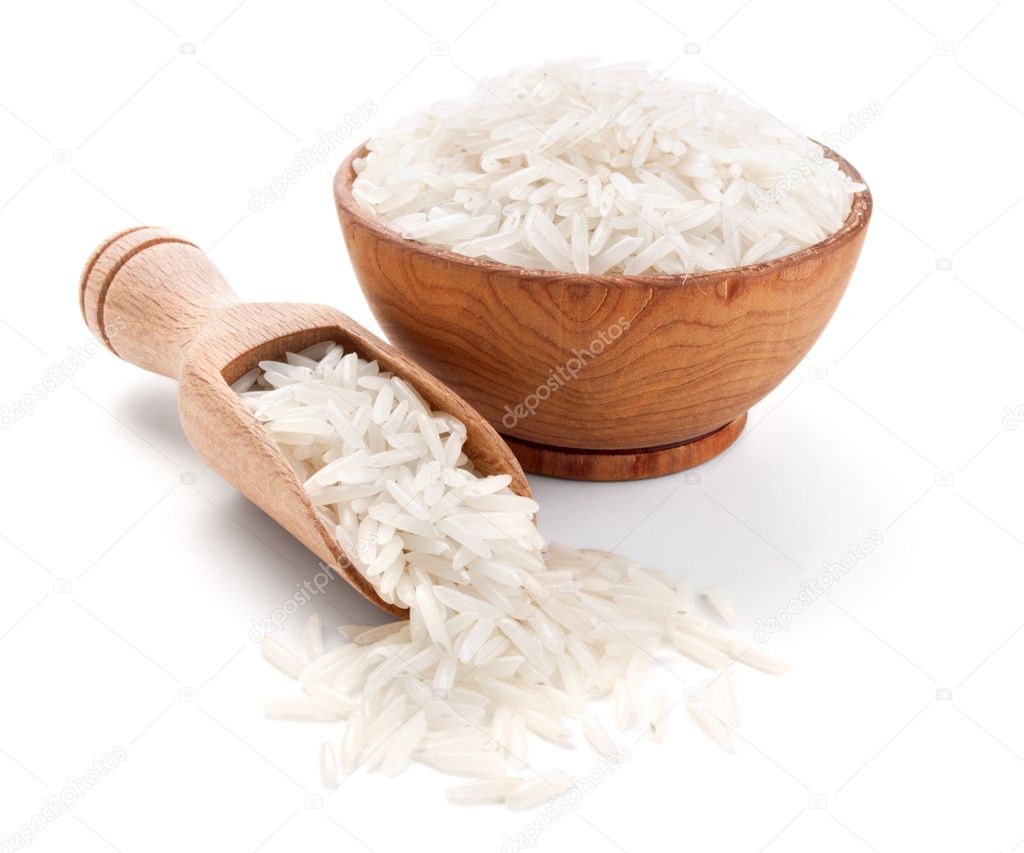 Basmati rice in a wooden bowl isolated on white