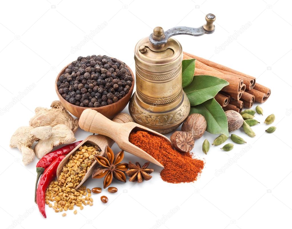 still life with spices and herbs isolated on white