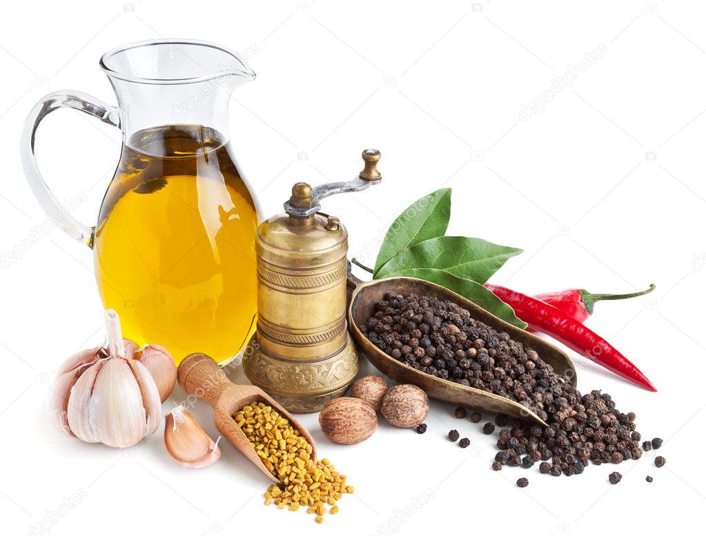 Retro still life with oil and spices isolated on white