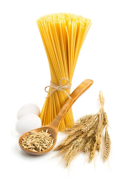 Still life with pasta ingredients isolated on white — Stock Photo, Image